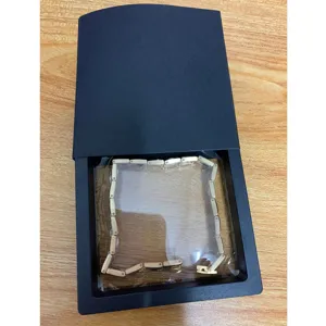 Exquisite gold link bracelet presented in a modern black gift box, perfect for daily wear.