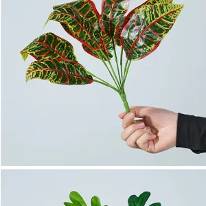 Detalle de rama de hoja de planta artificial, follaje vibrante para decoración del hogar y micro paisaje.