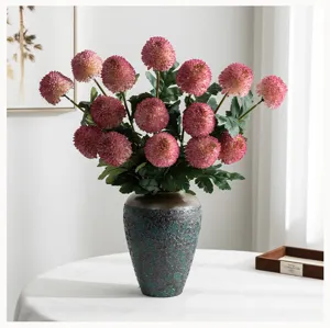 Artificial pompon chrysanthemum flower arrangement in textured vase for home decor and wedding display