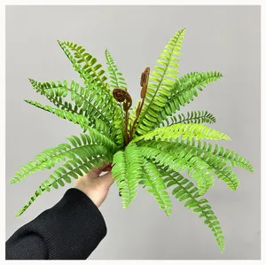 Detailed close-up of artificial fern leaf plant, realistic green foliage for home decor use.
