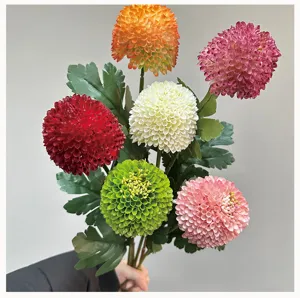 Detailed view of colorful artificial pompon chrysanthemum bouquet, ideal for home decor.