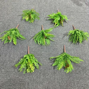 Artificial fern leaves set of 7 faux green plants for wall decor and home decoration.