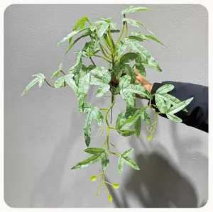 Artificial hanging plant fake green vine wall decor for home room interior decoration.