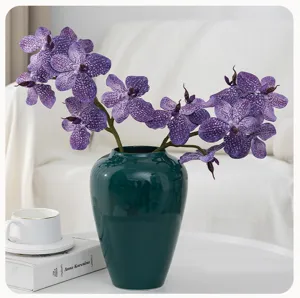 Artificial Phalaenopsis orchid floral arrangement with dark green ceramic vase for home decor