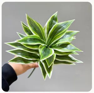 Artificial dracaena reflexa green leaves plant fake foliage for indoor home decor.