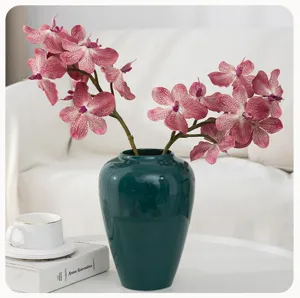 Artificial Phalaenopsis orchid floral arrangement with dark green ceramic vase for home decor
