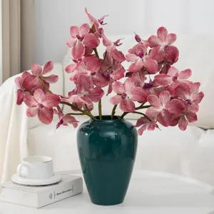 Artificial phalaenopsis orchid flower arrangement with dark green ceramic vase for home decor