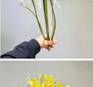 Artificial spider lily silk flower detail showing stem and petals for home decor and party.