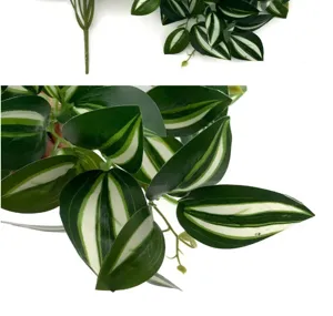 Artificial green plant hanging vine detail, realistic striped leaf texture for wall decor.