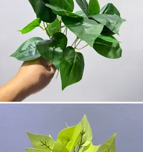 Detalle en primer plano de hojas de plantas verdes artificiales con textura viva y color.