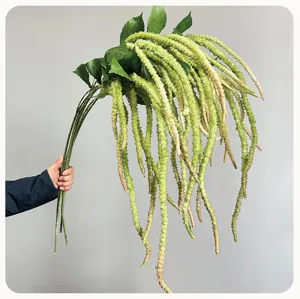 Close-up detail of artificial hanging amaranth flower strand, realistic texture for decor.