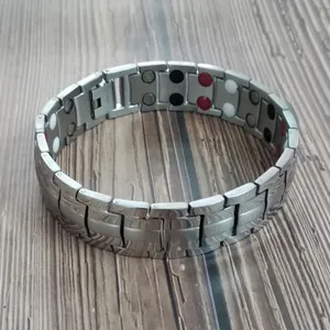 Stainless steel magnetic health bracelet for men and women, fashion link chain jewelry item.