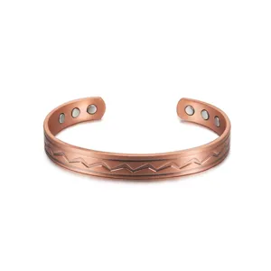 Bracciale magnetico in rame regolabile con motivo a onde e magneti incorporati per uso.