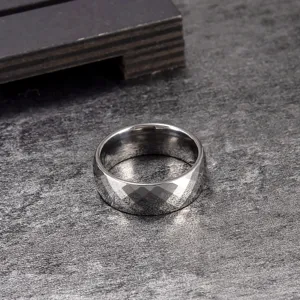 Detail view of the 8mm faceted tungsten carbide ring, scratch-resistant unisex minimalist band.