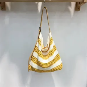 Yellow white striped knit shoulder bag detail shot casual summer beach style accessory