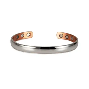 Close-up view of the adjustable magnetic copper cuff bracelet showcasing inner embedded magnets.