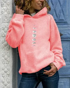Women's casual long sleeve hooded sweatshirt featuring stylish moon phase graphic detail.