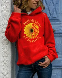 Women's long sleeve hooded sweatshirt featuring creative graphic print and front pocket detail.