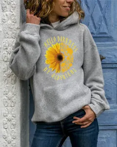 Casual grey long sleeve hooded sweatshirt with unique floral skull graphic print for women.