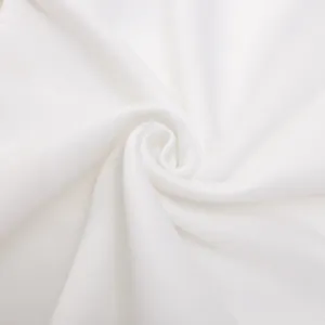 Plain white fabric textile material detail swatch, soft texture for comfortable apparel making.