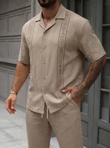 Men's casual linen short sleeve shirt and trousers set with geometric embroidery.