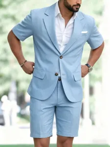 Detail view of men's light blue short sleeve suit summer casual blazer and shorts outfit.