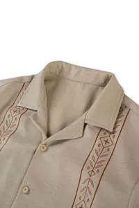 Men's casual breathable print shirt detail view, vintage geometric pattern and wood buttons.