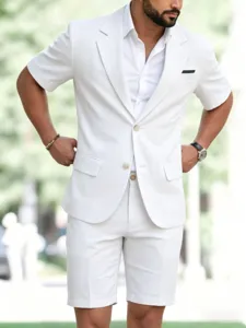 Close up detail of men's white short sleeve casual suit set in outdoor street style.