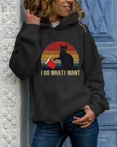 Women's black long sleeve hooded sweatshirt featuring vintage cat graphic and text.