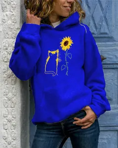 Detailed view of the royal blue hoodie featuring a cat and sunflower print graphic.