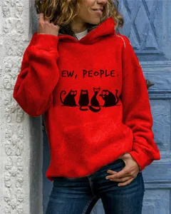 Detailed view of red hooded sweatshirt featuring funny cat graphic and text front design.