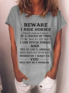 Casual short sleeve grey t-shirt for women featuring funny horse riding graphic print text.