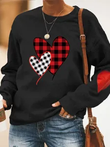 Women casual crewneck long sleeve sweatshirt with buffalo plaid heart print and elbow patch.