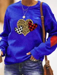 Detailed view of casual long sleeve sweatshirt featuring cute leopard and plaid heart print.