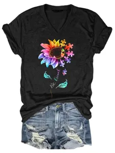 Women casual V-neck short sleeve t-shirt with colorful sunflower puzzle graphic and denim shorts.