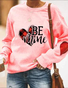 Valentine's Day pink crewneck sweatshirt with plaid heart graphic and elbow patch for women
