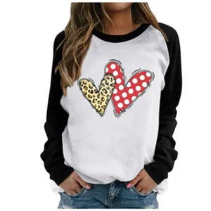 Women's long sleeve colorblock sweatshirt featuring cute leopard and polka dot heart print casual top.