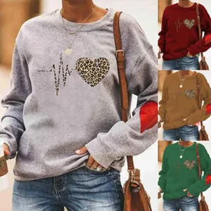 Details of the women's casual long sleeve crewneck sweatshirt with cute leopard heart print.