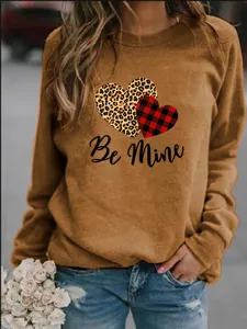 Valentine's Day long sleeve fleece sweatshirt with heart print and crew neck design.
