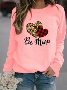Valentine pink fleece sweatshirt featuring leopard and plaid heart print, casual crewneck pullover.