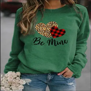 Green Valentine sweatshirt with leopard plaid hearts and Be Mine print for casual wear.