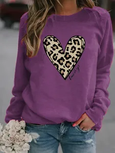 Women's purple long sleeve sweatshirt with leopard heart print graphic casual pullover top.