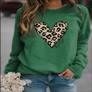 Women's green long sleeve sweatshirt featuring a chic leopard print heart graphic casual top.