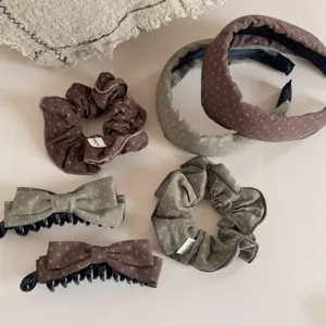 Maillard brown floral fabric scrunchie, headband, and claw clip hair accessory set.