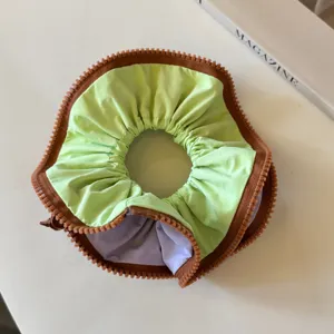Korean style creative zipper design hair scrunchie with soft fabric and high elasticity.