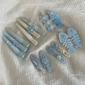 Blue cute children hair clips set featuring cartoon ocean starfish dolphin designs for girls.