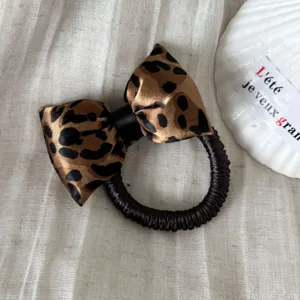 Coletero de pelo con lazo de leopardo vintage coreano coleta elástica versátil mujer.