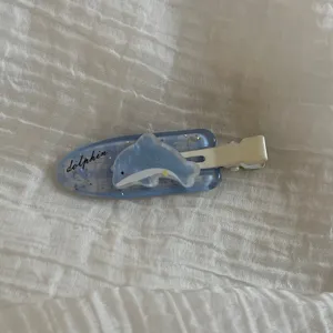 Blue cute dolphin hair clip for kids, sweet cartoon side clip for lovely daily hairstyles.