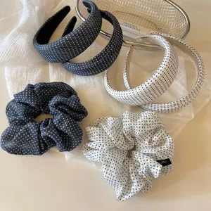 Korean style polka dot hair accessories detail view showing satin scrunchies and stylish headbands.
