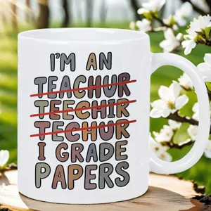 Funny teacher coffee mug white ceramic cup appreciation gift for educators and school staff.
